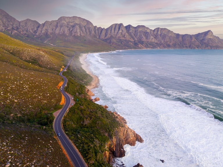 Beautiful coastal road at sunset, aerial view