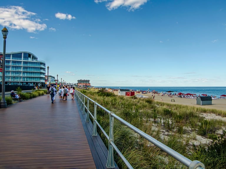 Long Branch, NJ boardwalk view of the beach and hotel