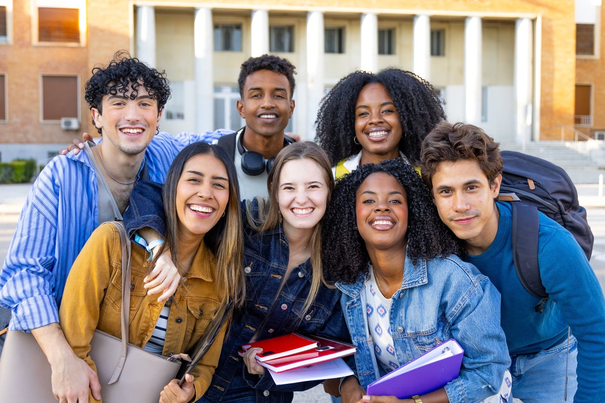 Happy diverse students together